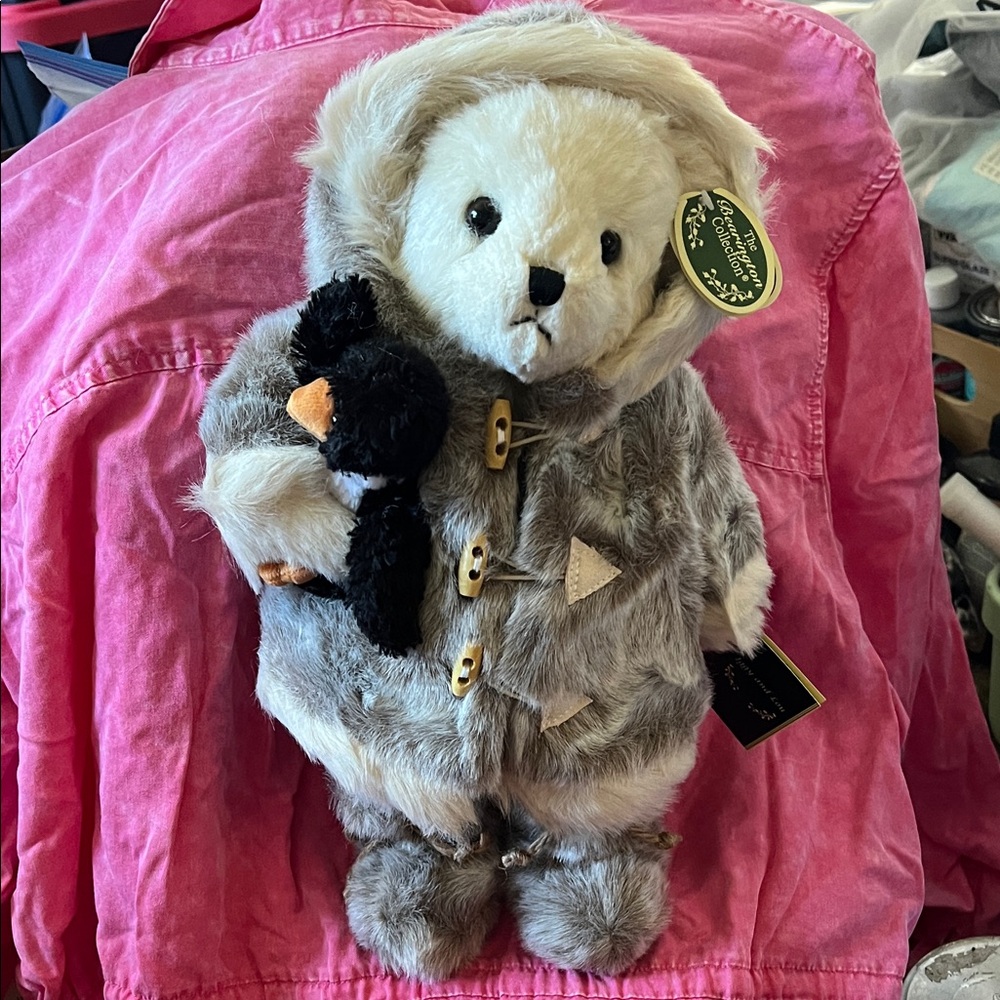 The Bearington Collection Gray and White Plush Bear he is in a polar suit